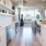 Open kitchen and living room with plenty of natural light.