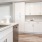 Open kitchen and living room with plenty of natural light.