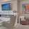 a resident lounge with chairs and a waterfront view